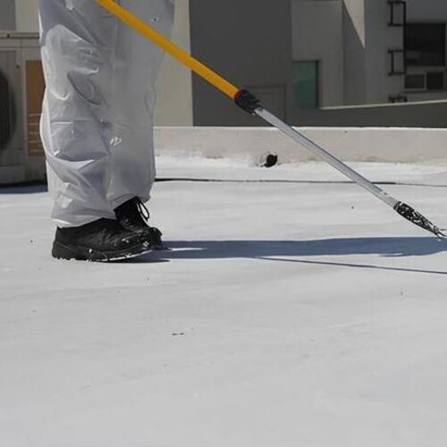 application of an acrylic roof coating
