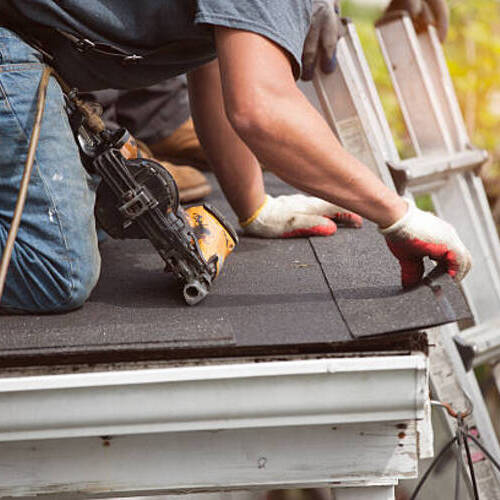 a roofer providing restoration services