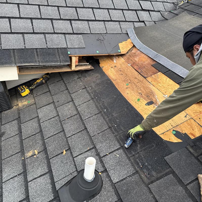 repairs to a shingle roof