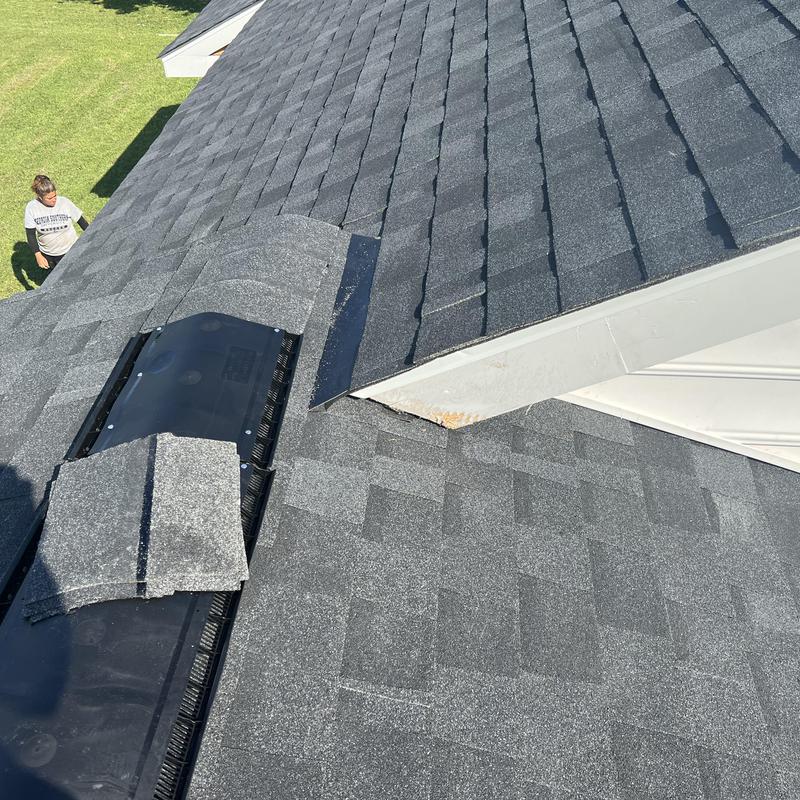 hail-damaged shingle roofing