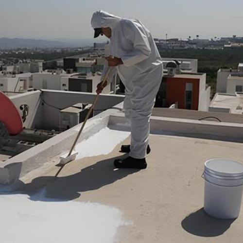 elastomeric roof coating being applied
