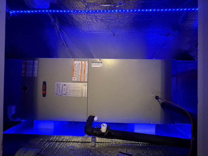 air handler unit on a blue light background