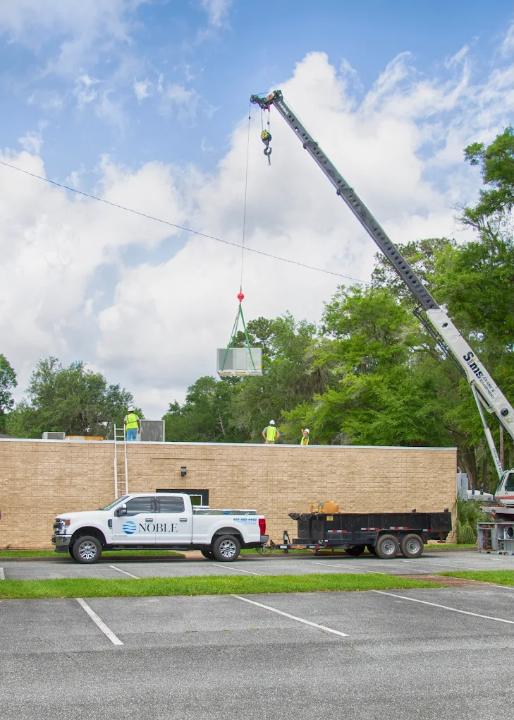 moving an AC unit onto a building's roof