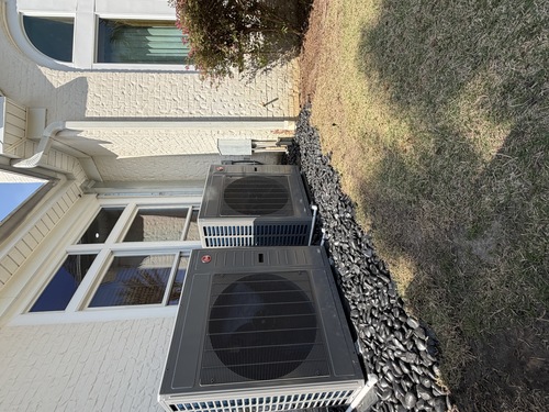 pair of outdoor air conditioning units