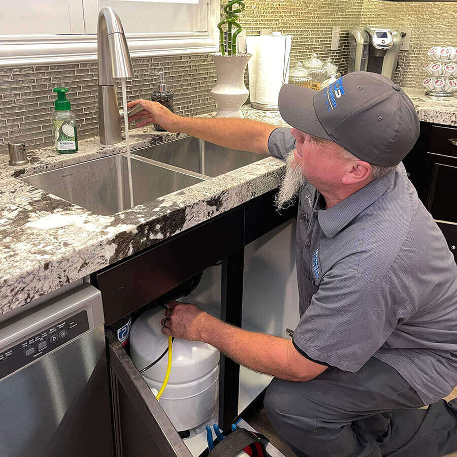 plumber providing repairs for low water pressure