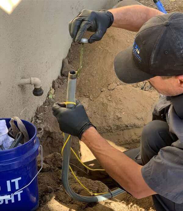 plumber installing a gas line