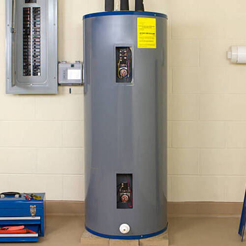 Residential Water Heater with the panel removed for repairs or adjustments to the thermostat. 