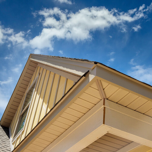 view from below of a soffit along a roof
