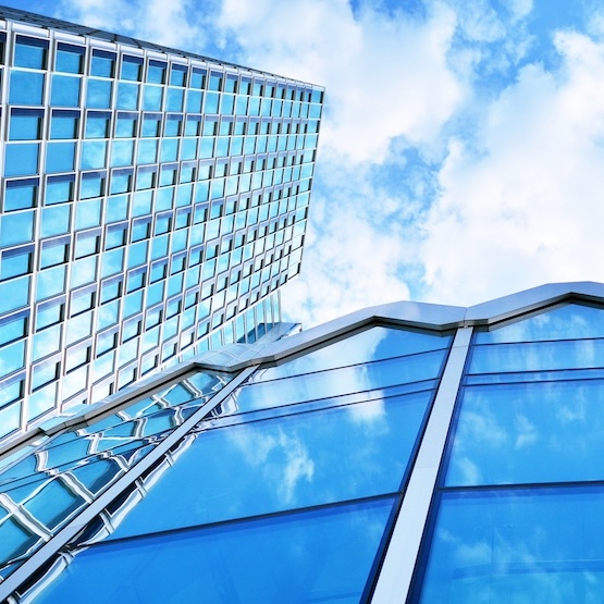 Office buildings with picturesque sky in background.