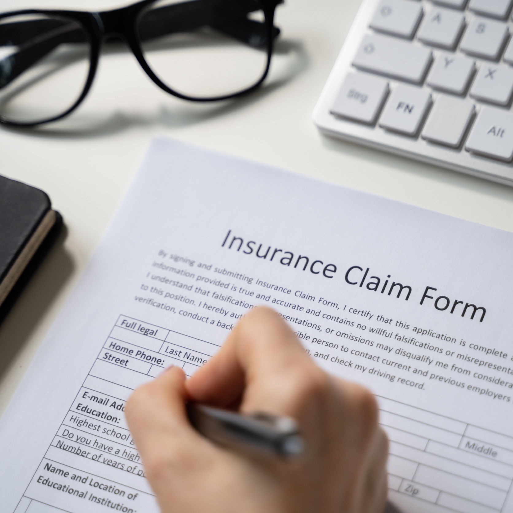 filling out a insurance claim form